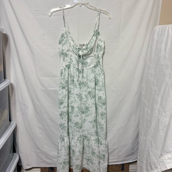 Inspired Hearts Dresses & Skirts - Ivory green floral ruffle trim midi dress with a floral print, smocked waist,